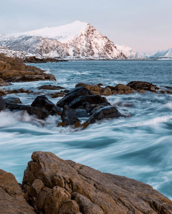 Mountain behind ocean