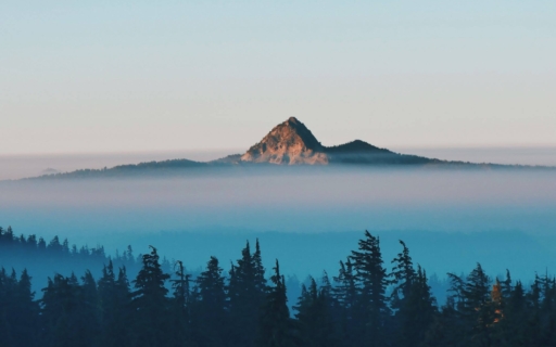 Mountain emerging from cluods